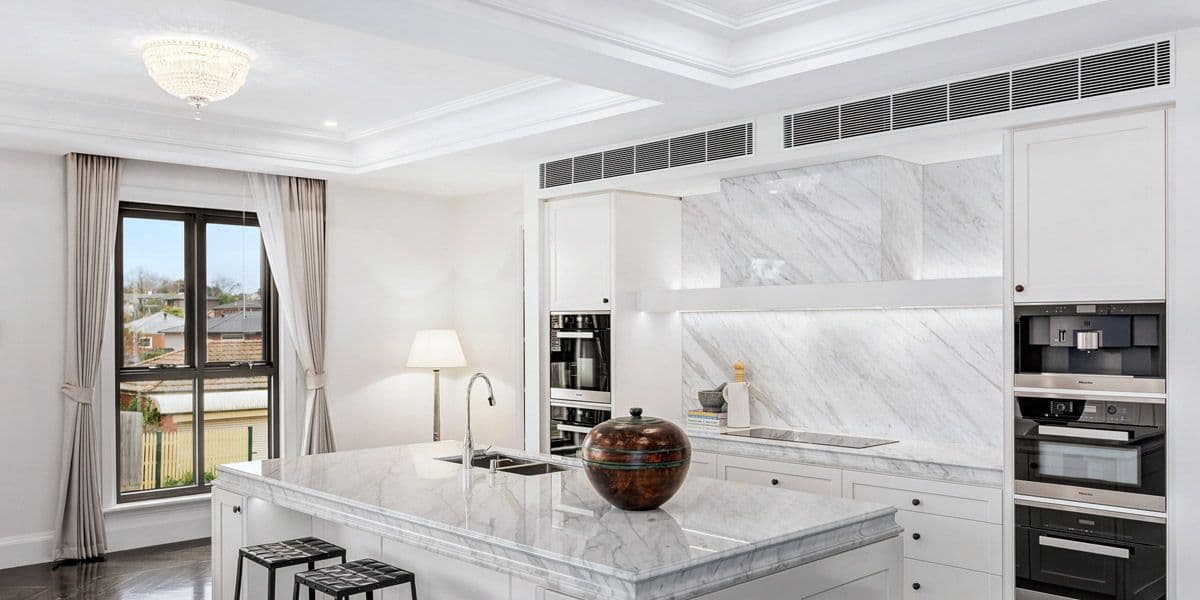 Stylish interior showcasing discreet ceiling cassette installation